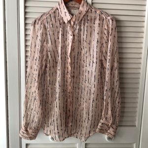 A long sleeve gold buttons very beautiful blouse